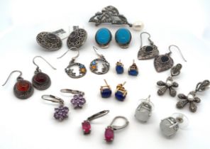 Eleven pairs of gem set earrings, including ruby, amethyst, moonstone, amber etc, all stamped as 925