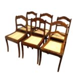 6 Stühle im Biedermeierstil; wohl um 1890; Nussbaum, teilmassiv; Sitzflächen gepolstert und überwie