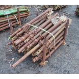 Stillage of steel props as photographed