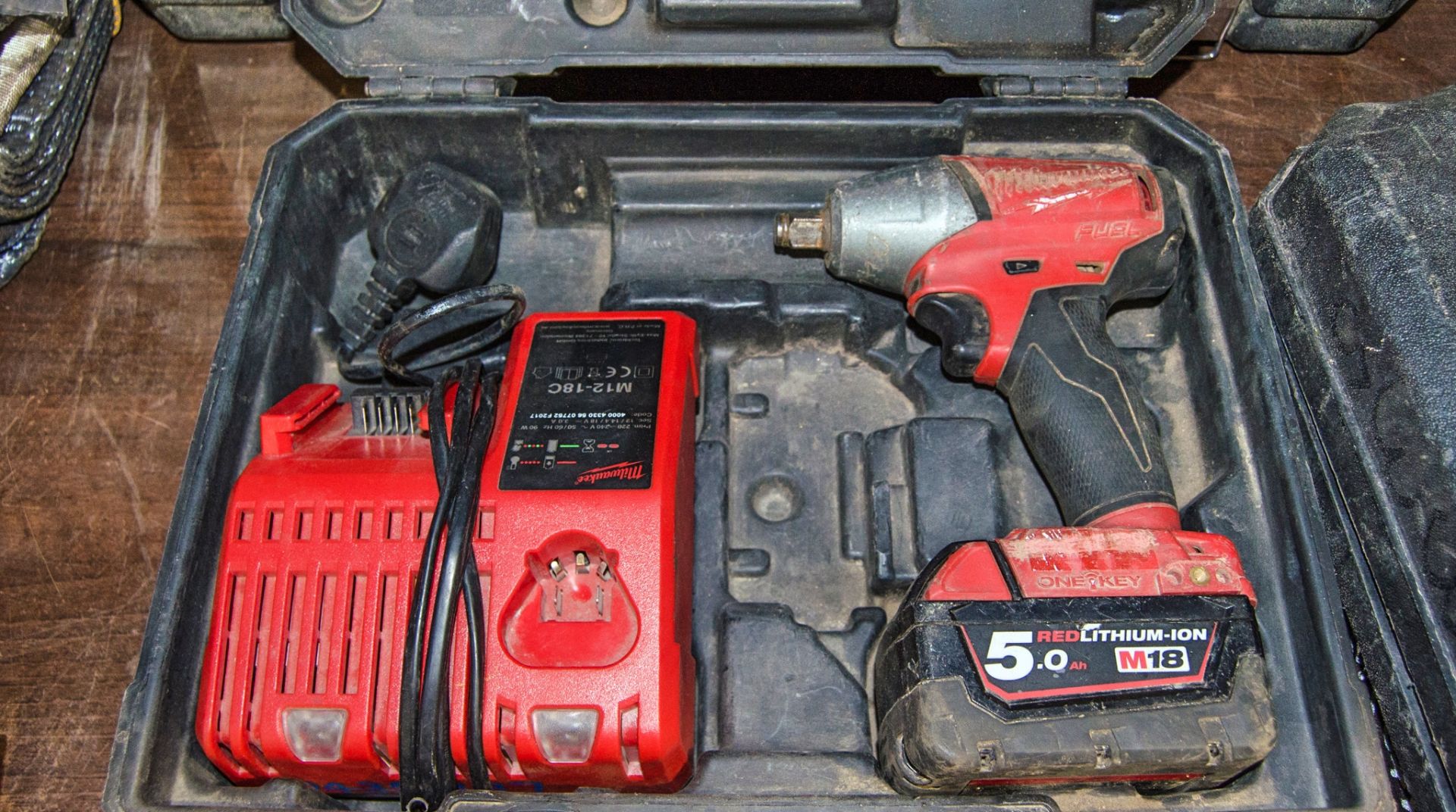 Milwaukee 18v cordless 1/2 inch drive impact gun c/w battery, charger and carry case 04350187