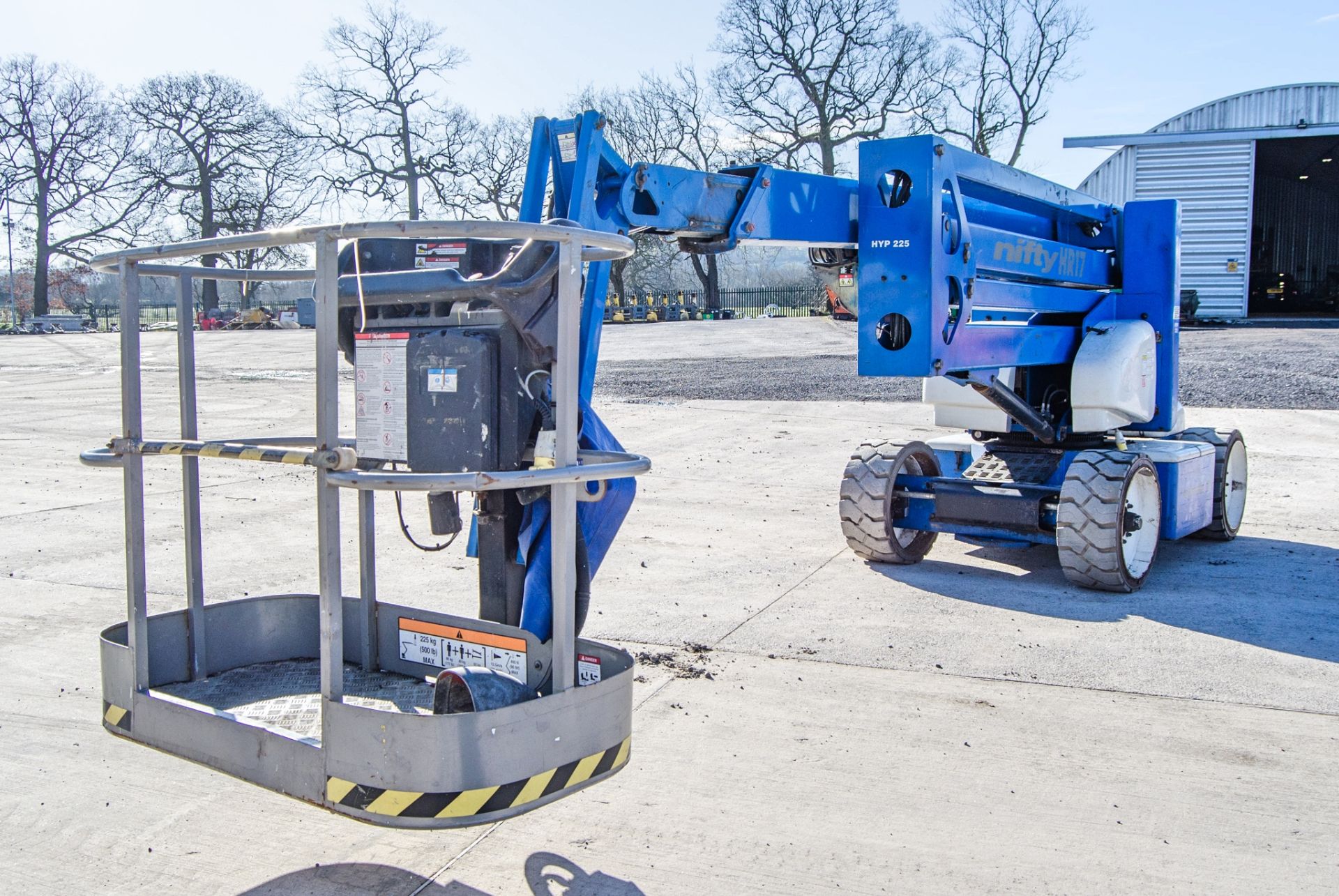 Nifty HR17 battery electric/diesel driven articulated  boom lift access platform Year: 2012 S/N: