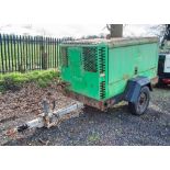 Doosan 9110 diesel driven fast tow mobile air compressor Year: 2013 S/N: 659402 Recorded hours: 4998