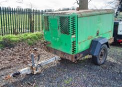 Doosan 9110 diesel driven fast tow mobile air compressor Year: 2013 S/N: 659402 Recorded hours: 4998
