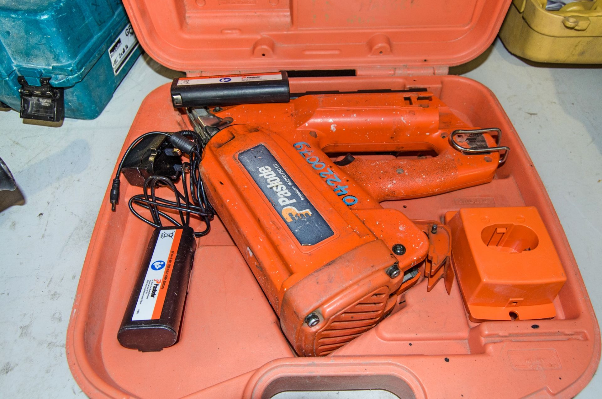 Paslode IM350/90 CT nail gun c/w 2 batteries, charger and carry case 04220079