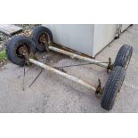 Pair of trailer axles & wheels ** No VAT on hammer but VAT will be charged on buyer's premium **