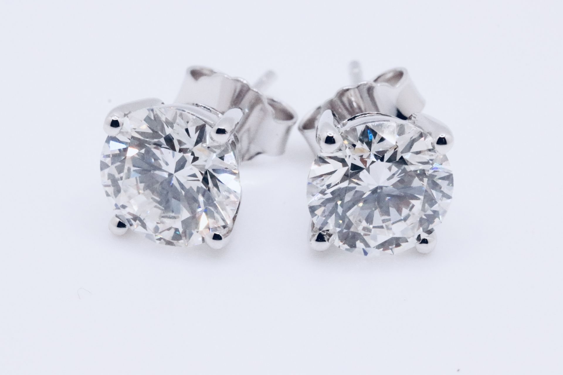 Round Brilliant Cut 6.00 Carat Diamond Earrings Set in 18kt White Gold - D Colour VVS Clarity - IGI