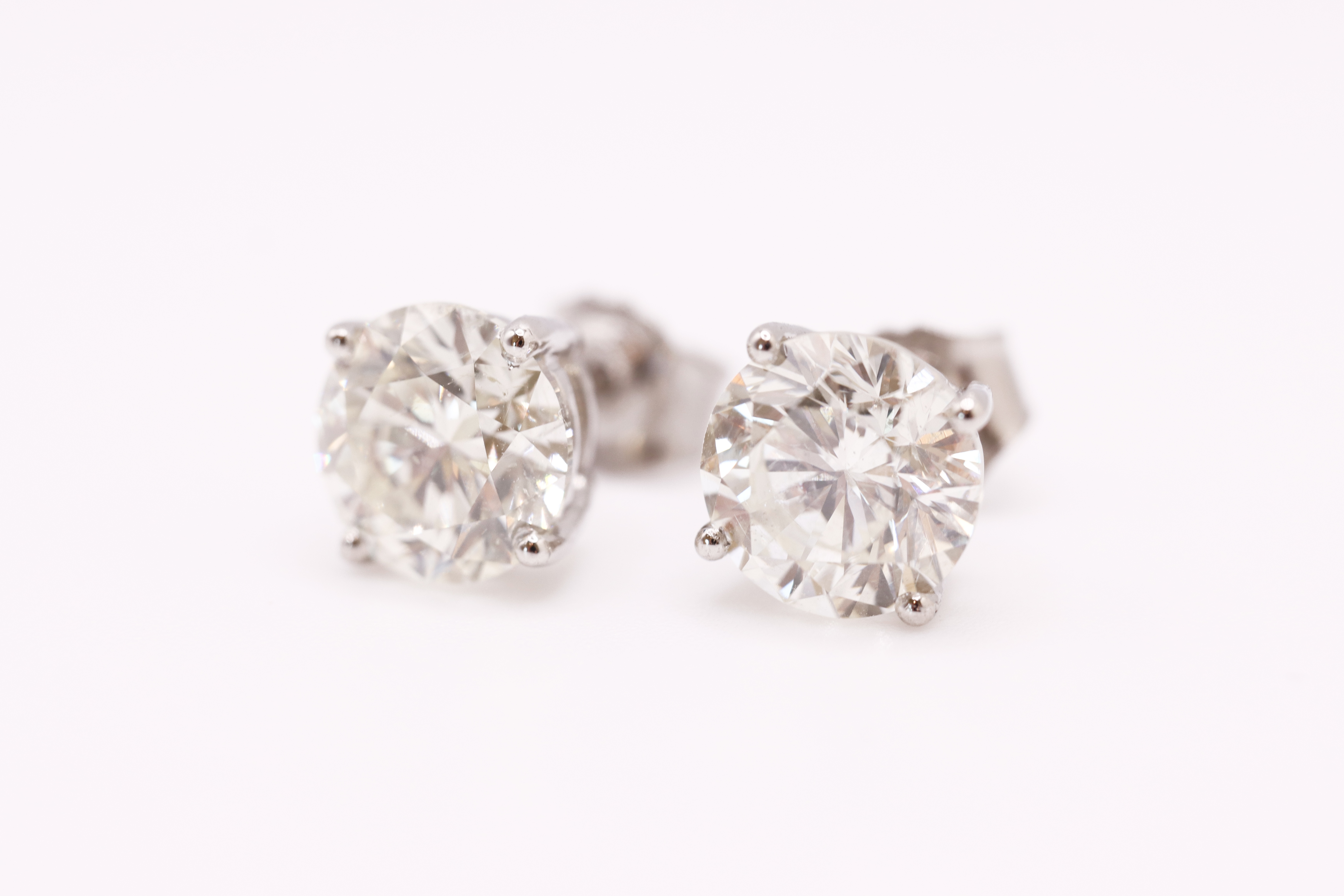 Round Brilliant Cut 6.00 Carat Diamond Earrings Set in 18kt White Gold - D Colour VVS Clarity - IGI