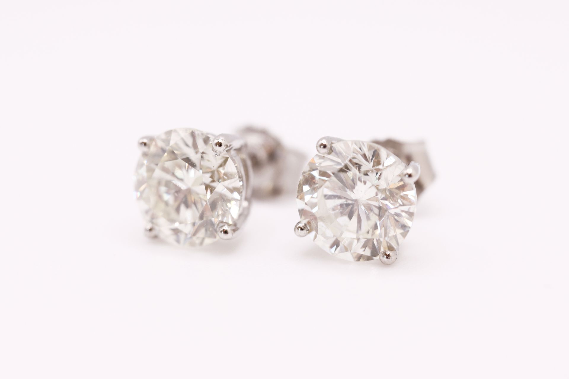 Round Brilliant Cut 6.00 Carat Diamond Earrings Set in 18kt White Gold - D Colour VVS Clarity - IGI