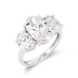Oval Brilliant Cut 5.07ct Trilogy Ring F Colour VS1 Clarity -Set 18KT White Gold- IGI CERTIFIED