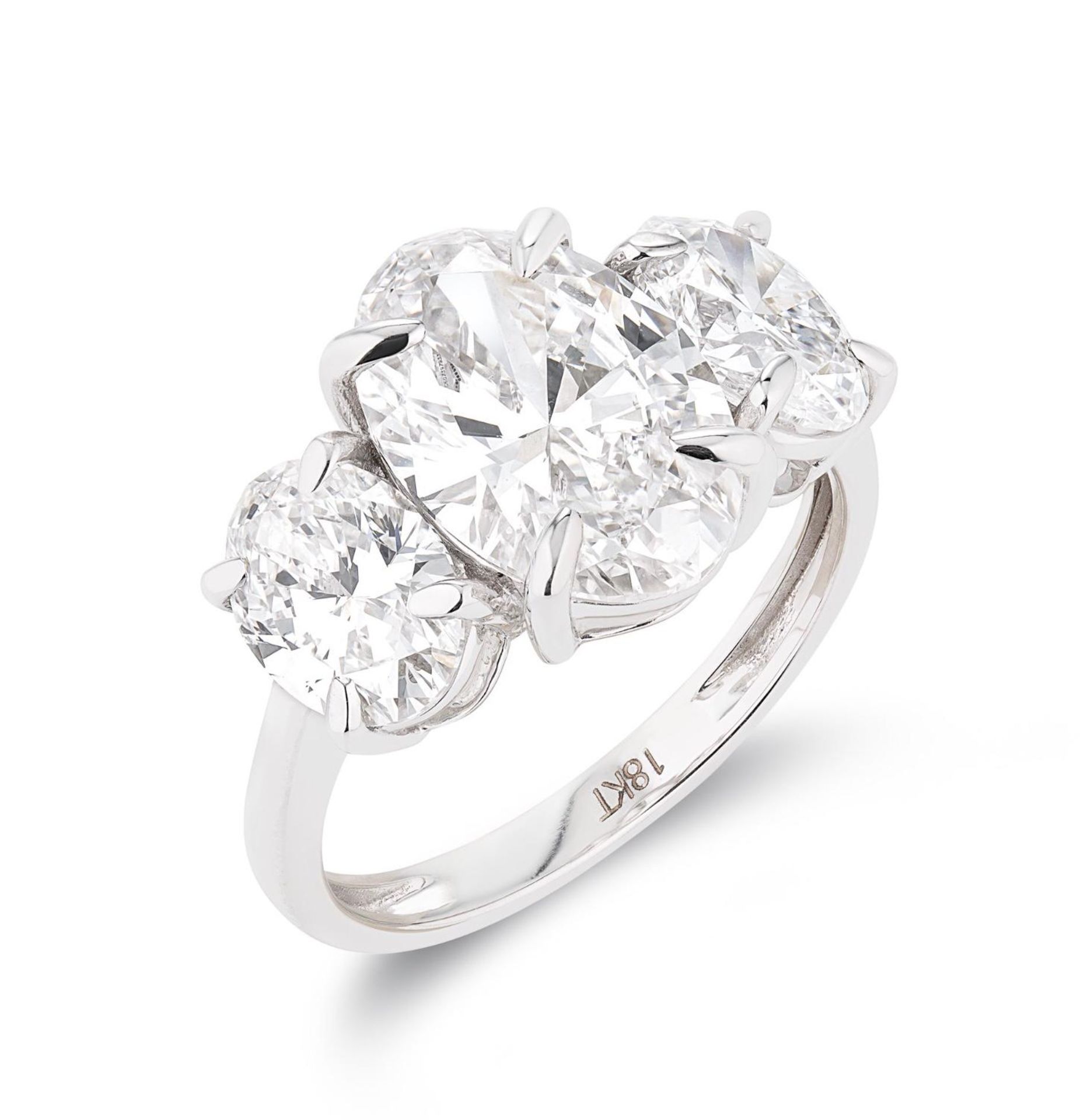 ** ON SALE ** Oval Brilliant Cut 5.07ct Trilogy Ring F Colour VS1 Clarity -Set 18KT White Gold