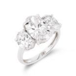 ** ON SALE ** Oval Brilliant Cut 5.07ct Trilogy Ring F Colour VS1 Clarity -Set 18KT White Gold