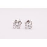 Round Brilliant Cut 4.00 Carat Diamond Earrings Set in 18kt White Gold - D Colour VS Clarity - IGI
