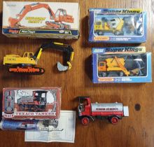 Group of Four Die Cast Trucks and Industrial Vehicles, inc Dinky Atlas Digger, Matchbox Super Kings