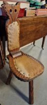 Carved Cow Hide Spinning Chair
