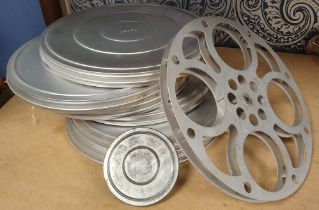 Original 16mm Film Camera aluminium film cans containing spools, together with a spare spool and sma