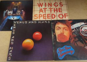 4 Vinyl LP Records by Paul McCartney & Wings, comprising Venus & Mars, Red Rose Speedway, Wings at t