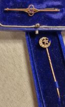 9ct Gold & Ameythst Cased Brooch + a 9ct Gold & Diamond Cased Pin, 2.45g combined