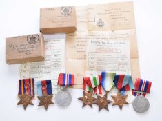WW2: A Royal Navy medal trio and Merchant Navy group of four