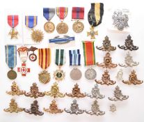 A mixed group of foreign medals and some badges