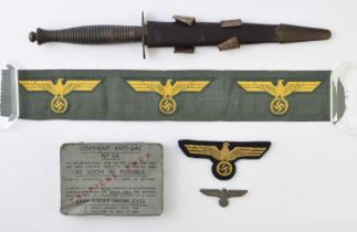 Third Pattern Fighting Knife and WW2 German cloth insignia