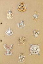 Album of military badges including Scottish Regiments