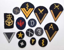 Group of German Kriegsmarine and Luftwaffe trade insignia and one US Navy patch