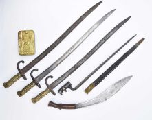 Mixed group of bayonets, 1914 Christmas tin and a kukri