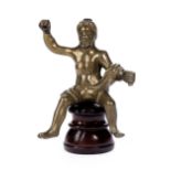 Kleine Bronzefigur eines sitzenden Mannes