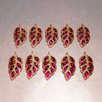 Ruby gold branch and jade leaf pendant