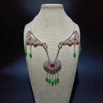 Old silver necklace set with ruby ​​green emerald longevity lock