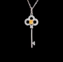 Yellow diamond key pendant