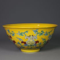 Ming Dynasty Chenghua year yellow ground doucai flower pattern bowl