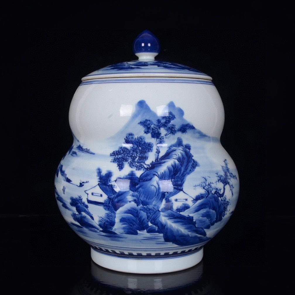 Qing Kangxi blue and white landscape pattern lid jar