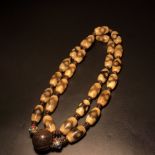 Yellow teeth, old agate mandala, three-eyed dzi beads, rosary necklace, handheld