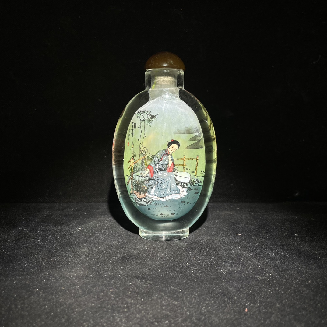 Colored glaze snuff bottle with inner painting of ladies