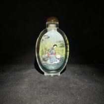 Colored glaze snuff bottle with inner painting of ladies