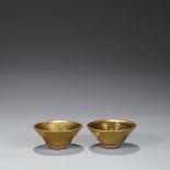 A pair of gold-glazed oil-drop lamps from Jian Kiln, Northern Song Dynasty