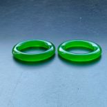 A pair of top-grade dragon stone imperial green bracelets