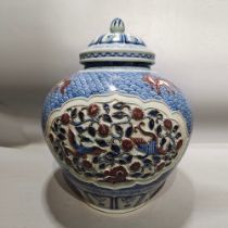 Yuan blue and white underglaze red pinch flower phoenix pattern lid jar