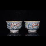 A pair of red-bodied bucket-colored gilt hand cups with double-dragon pattern, Chenghua, Ming Dynast