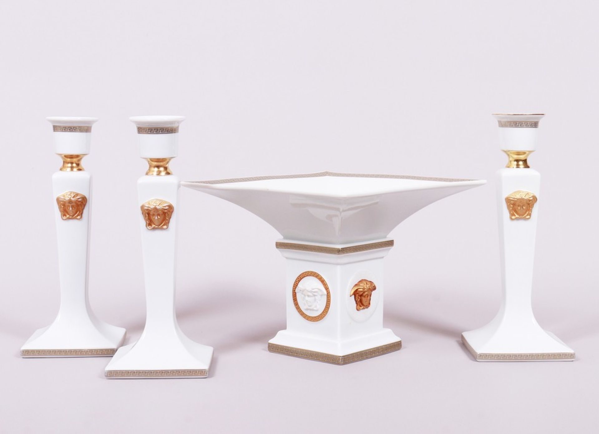 Footed bowl and three candlesticks, design “Ikarus” by Paul Wunderlich/decor “Gorgona” by Gianni Ve