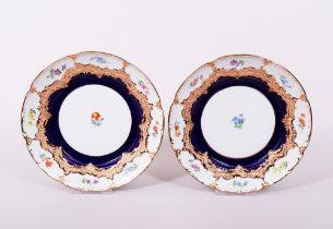 2 cake plates, Meissen, B-shape with cobalt blue background, 2nd H. 20th C.