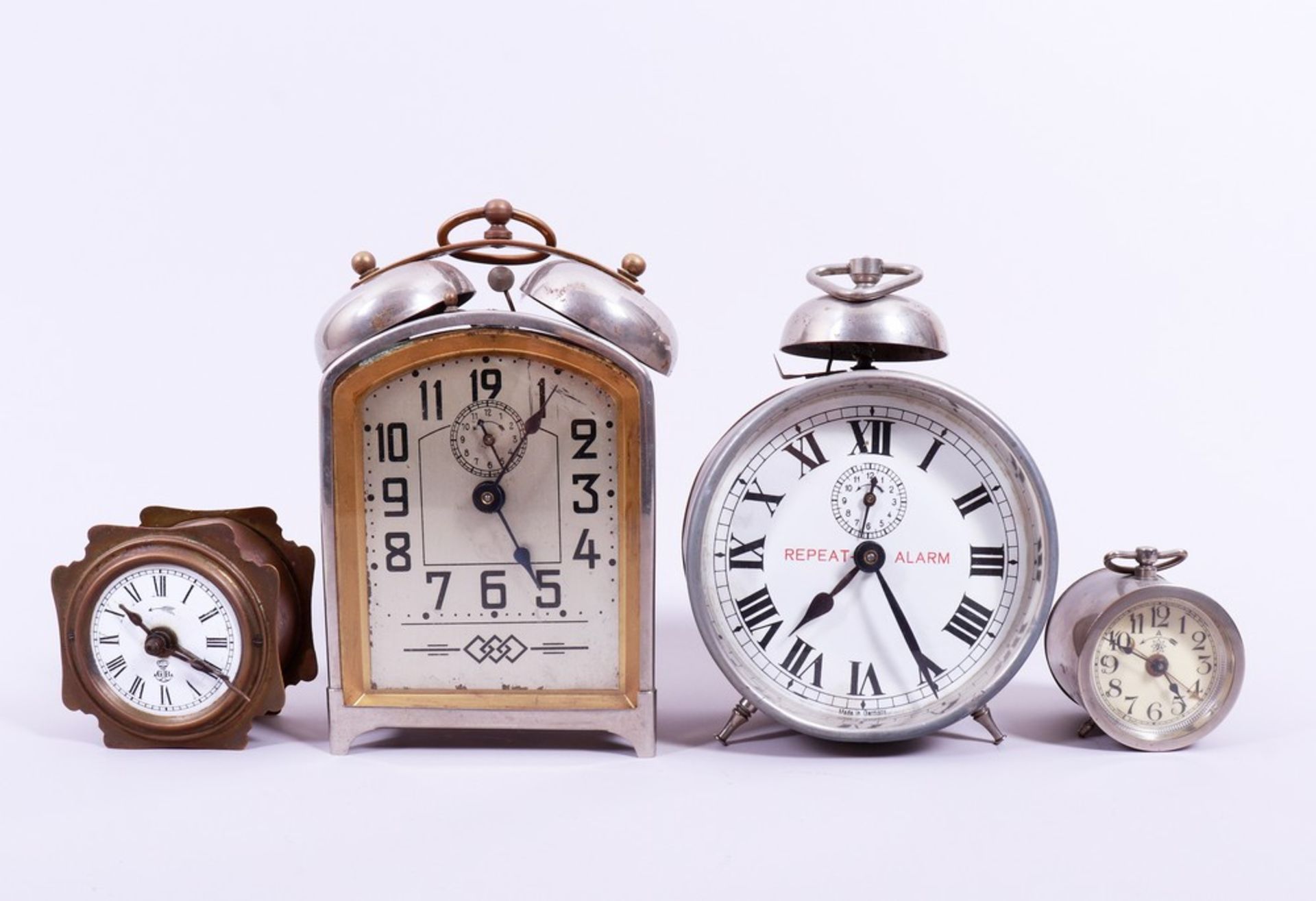 4 table alarm clocks, Gustav Becker/Junghans and others, c. 1900/20