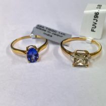 A 14 ct gold diaspore and diamond solitaire ring along with a Tanzanite solitaire ring. The diaspore