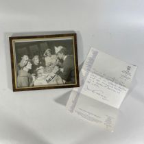 A signed Bette Davis photograph with a Heritage Foundation letter of authentication frame size