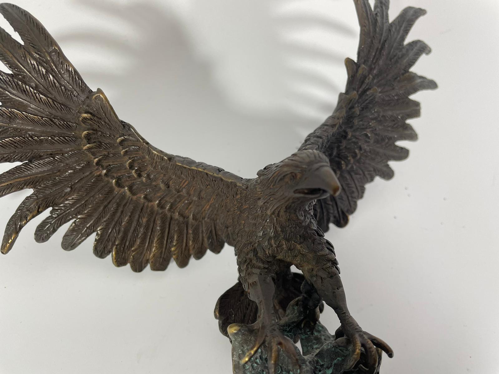 A bronze group of an eagle about to catch a leaping salmon. Approximately 25cm tall with good - Image 7 of 7