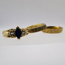 A pair of vintage Kutchinsky barrel rings in 18ct gold, along with a sapphire and diamond 14ct