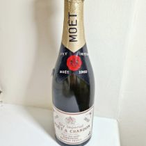 Moet & Chandon, a 1969 bottle of dry imperial finest extra quality Champagne.  Seal good