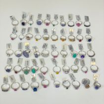 A collection of 50 gem set sterling silver rings. All new with tags. TO include gemstones such as