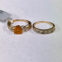 A 9ct yellow gold diamond set half hoop ring. Size S. Along with a fire opal and diamond ring -